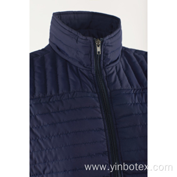 Navy quilted light vest with stand collar